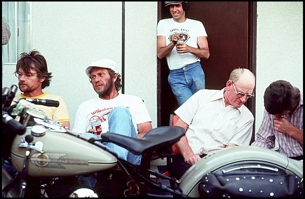 McQueen pictured center with his 1938 Harley-Davidson WLD Sport which Mecum sold for US$125,000 in November, 2013.