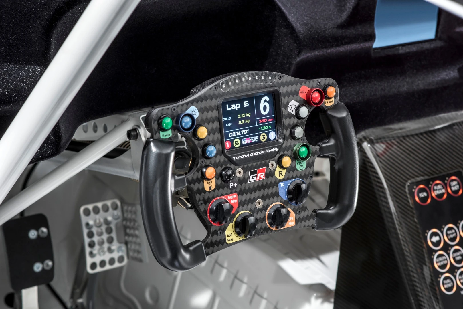 The driver's quick-release steering wheel is sourced from OMP and includes paddle shifting