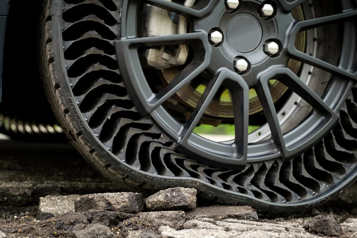 Road hazards are absorbed by the Uptis tire, eliminating about 200 million tires a year that are scrapped early due to damage