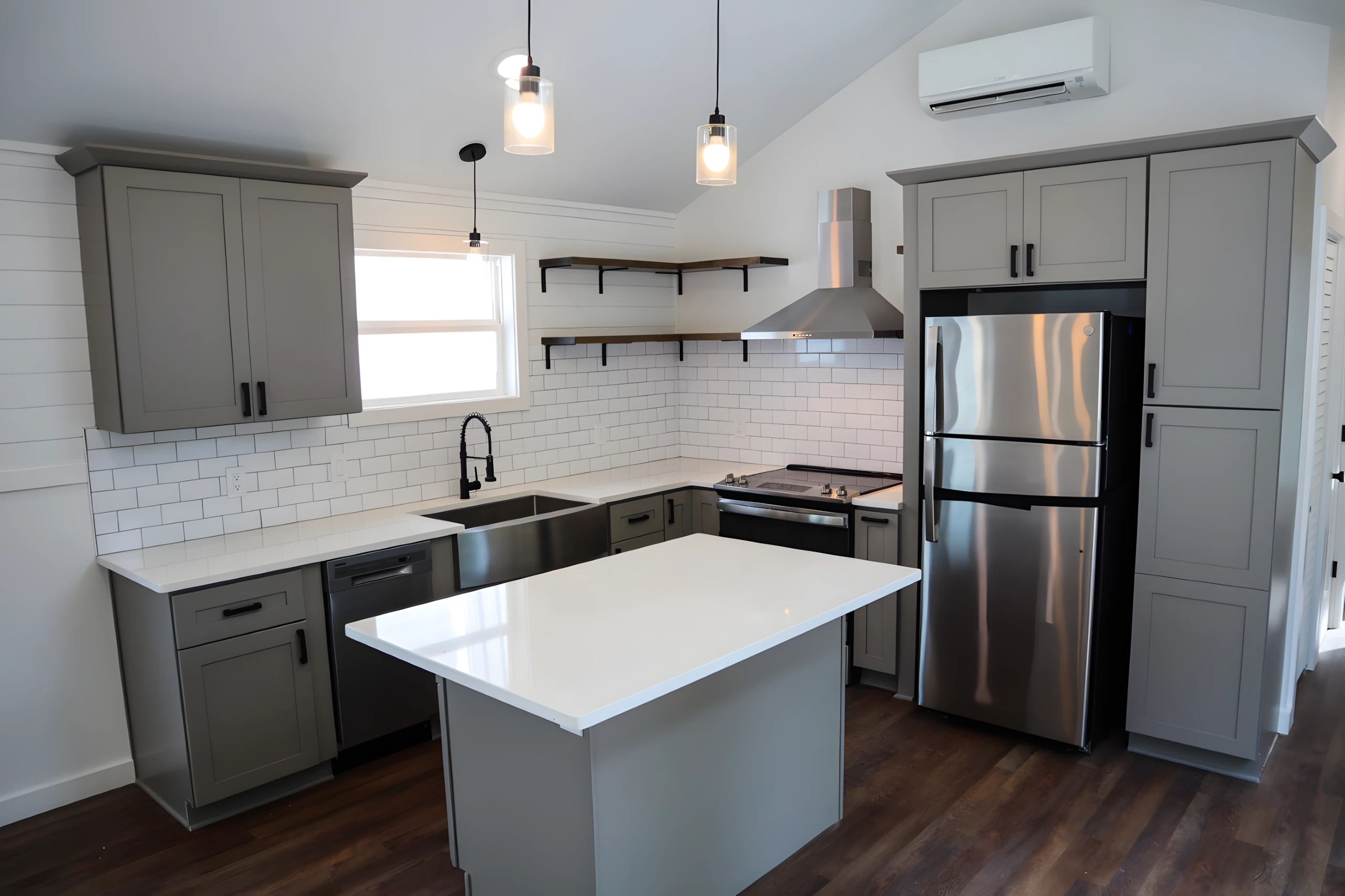 The Dogwood's kitchen has lots of cabinetry and, thanks to its increased width, has a layout that's more like a full-sized home than a tiny house