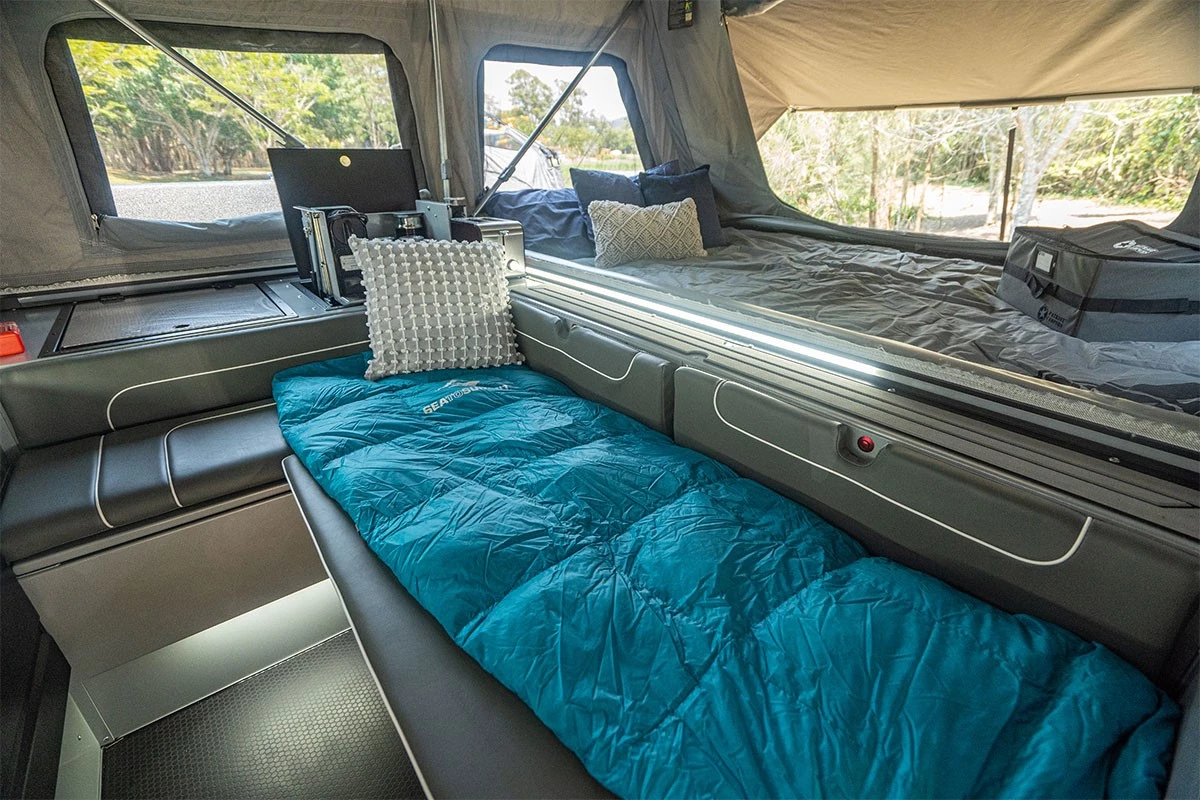 The main seating bench becomes a single bed at night