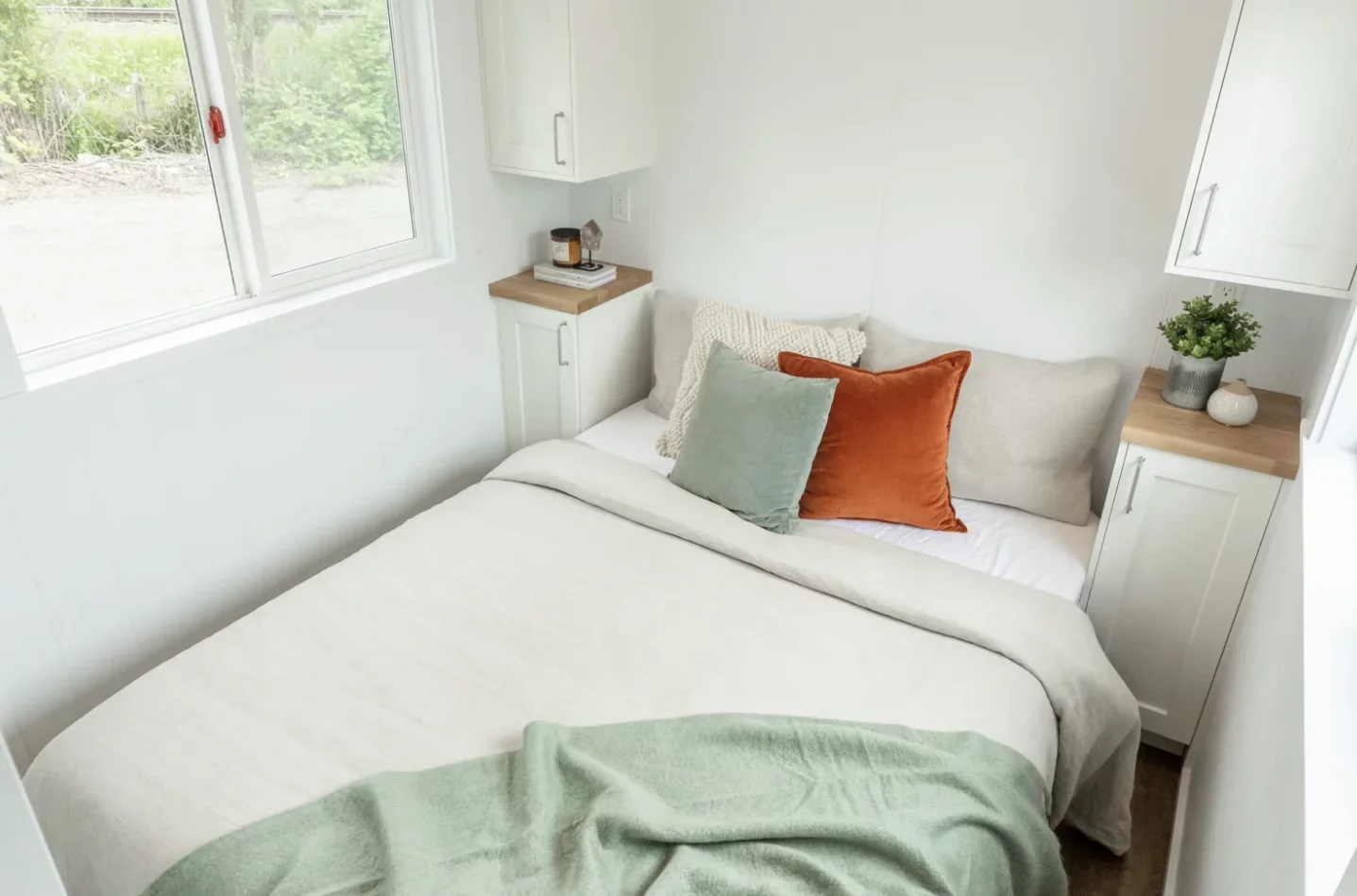 The Loft Ruby Edition's master bedroom is located downstairs and has ample headroom to stand upright, which is still a luxury in a tiny house