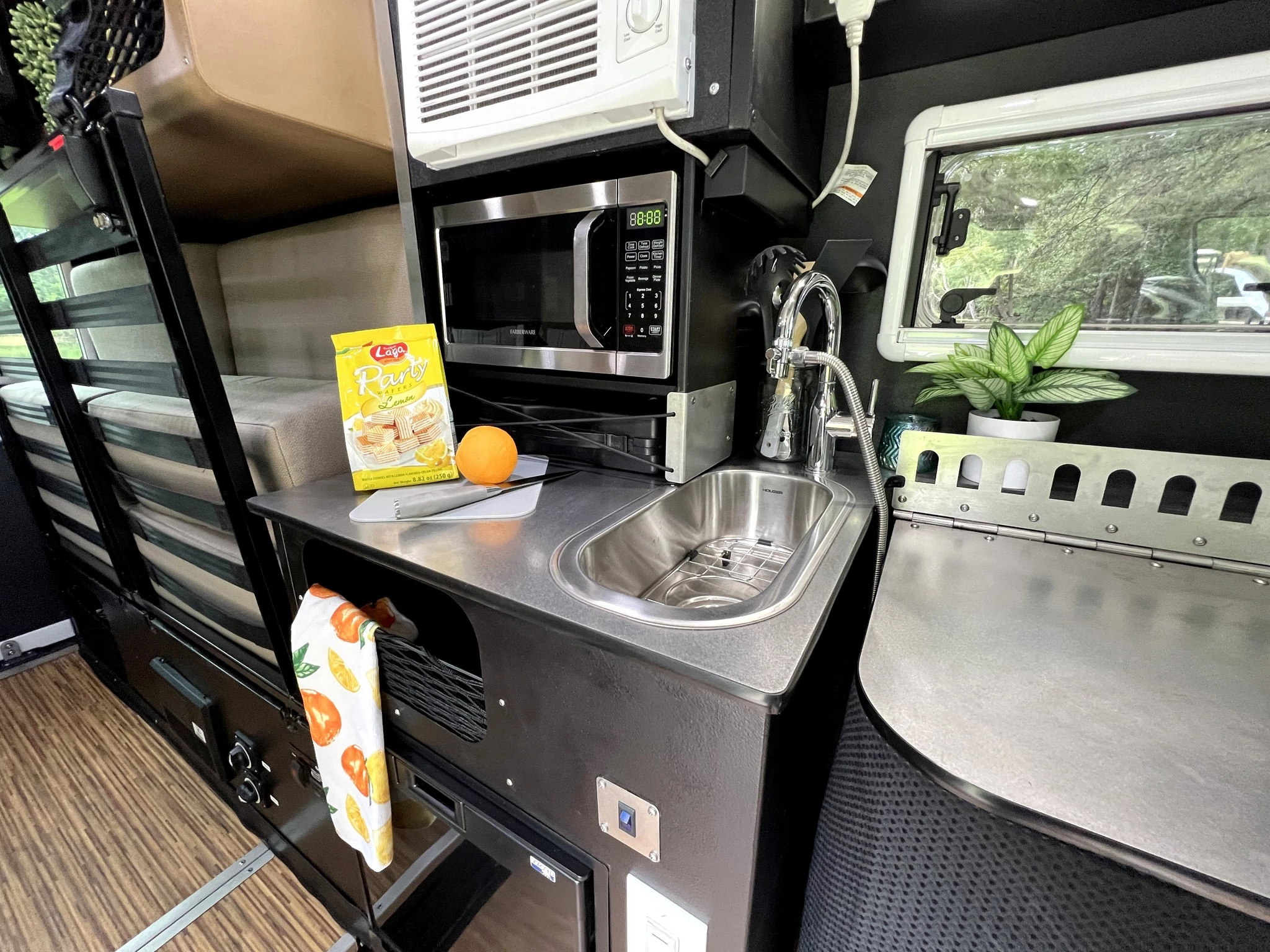 The Access' main kitchen block is compact but well-equipped and augmented by the spare worktop that conceals the toilet
