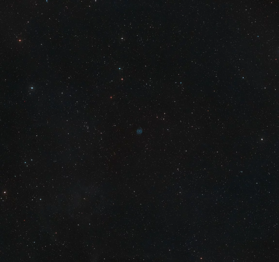 A composite view made from exposures collected for the Digitized Sky Survey 2 showing the region surrounding ESO 577-24, which can be found in the center of the image