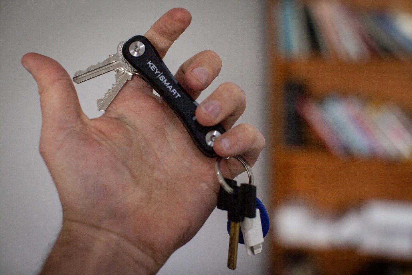 The KeySmart Pro is a key organizer that arranges your keys into a neat package