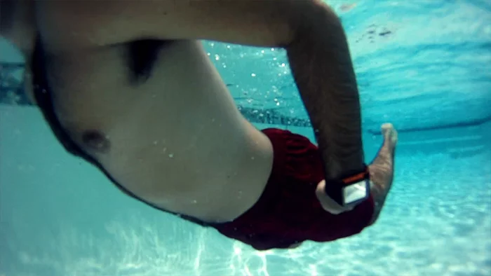 The sportwatch has a water resistance rating of 5 ATM that makes it suitable for wearing while swimming but not diving