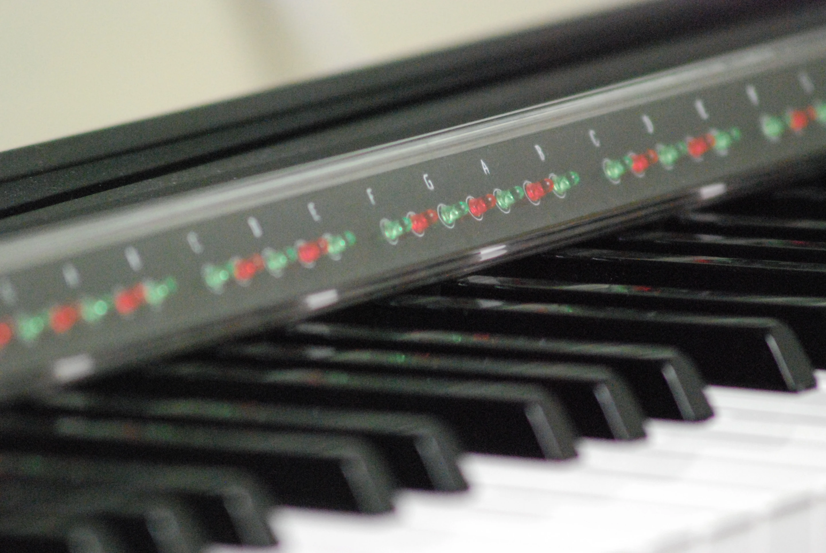 The PianoMaestro learning system consists of MIDI-reading PC software and a ruler-like LED bar that's placed at the back of a piano keyboard, and signals where and when notes need to be played