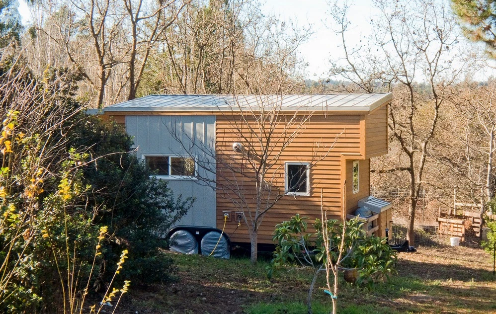 The facade features the use of two different exterior cladding materials