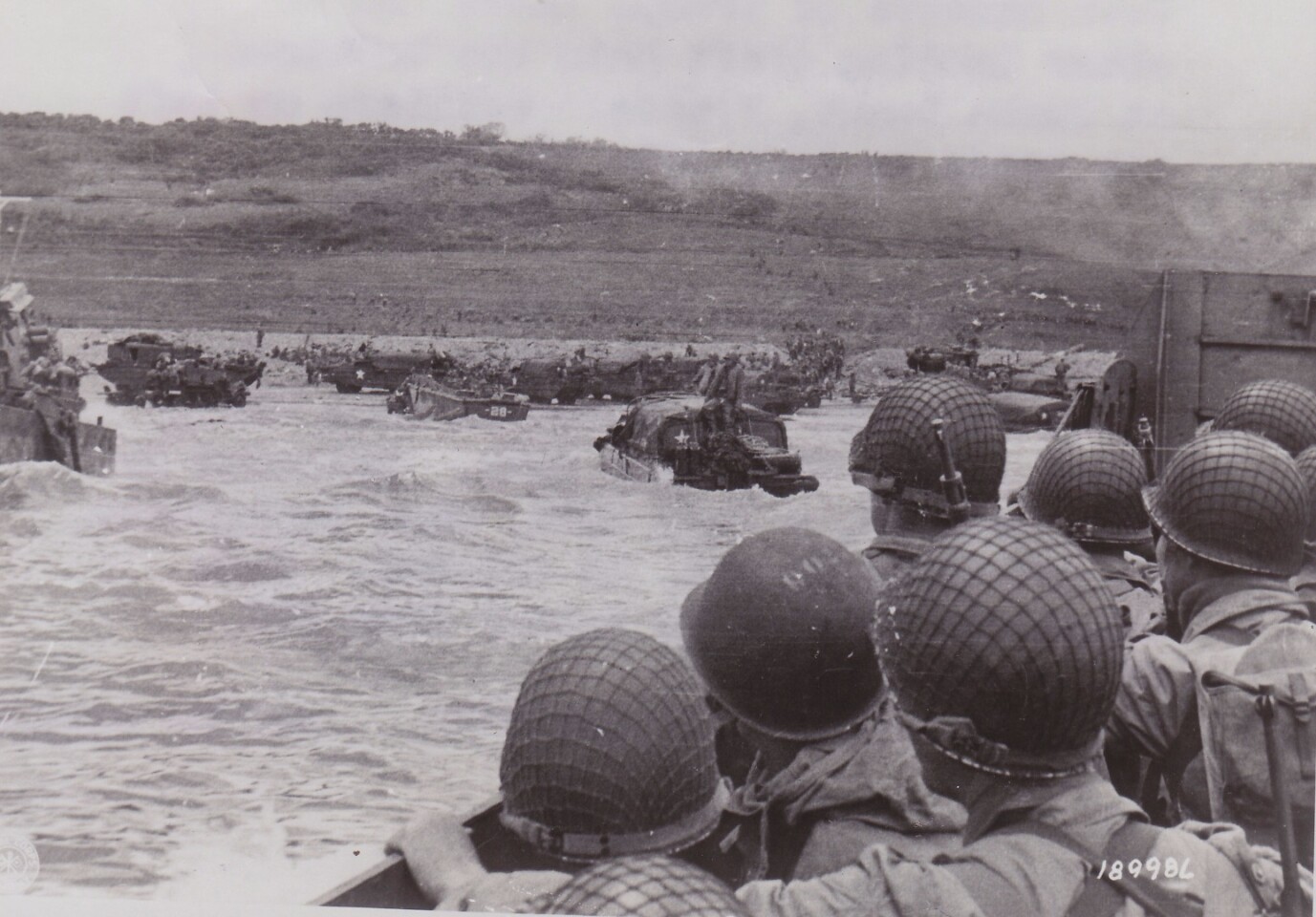 Welcome to hell. Allied troops get a look at what they face for the first time, probably from within a "duck"