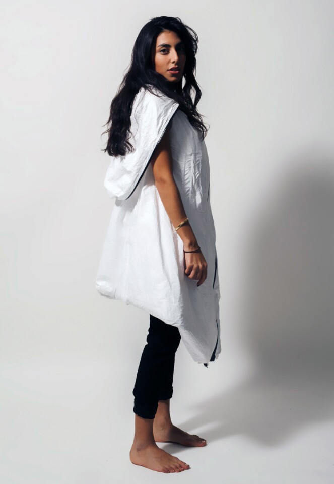 The lightweight wearable shelter resembles a loose-fitting parka