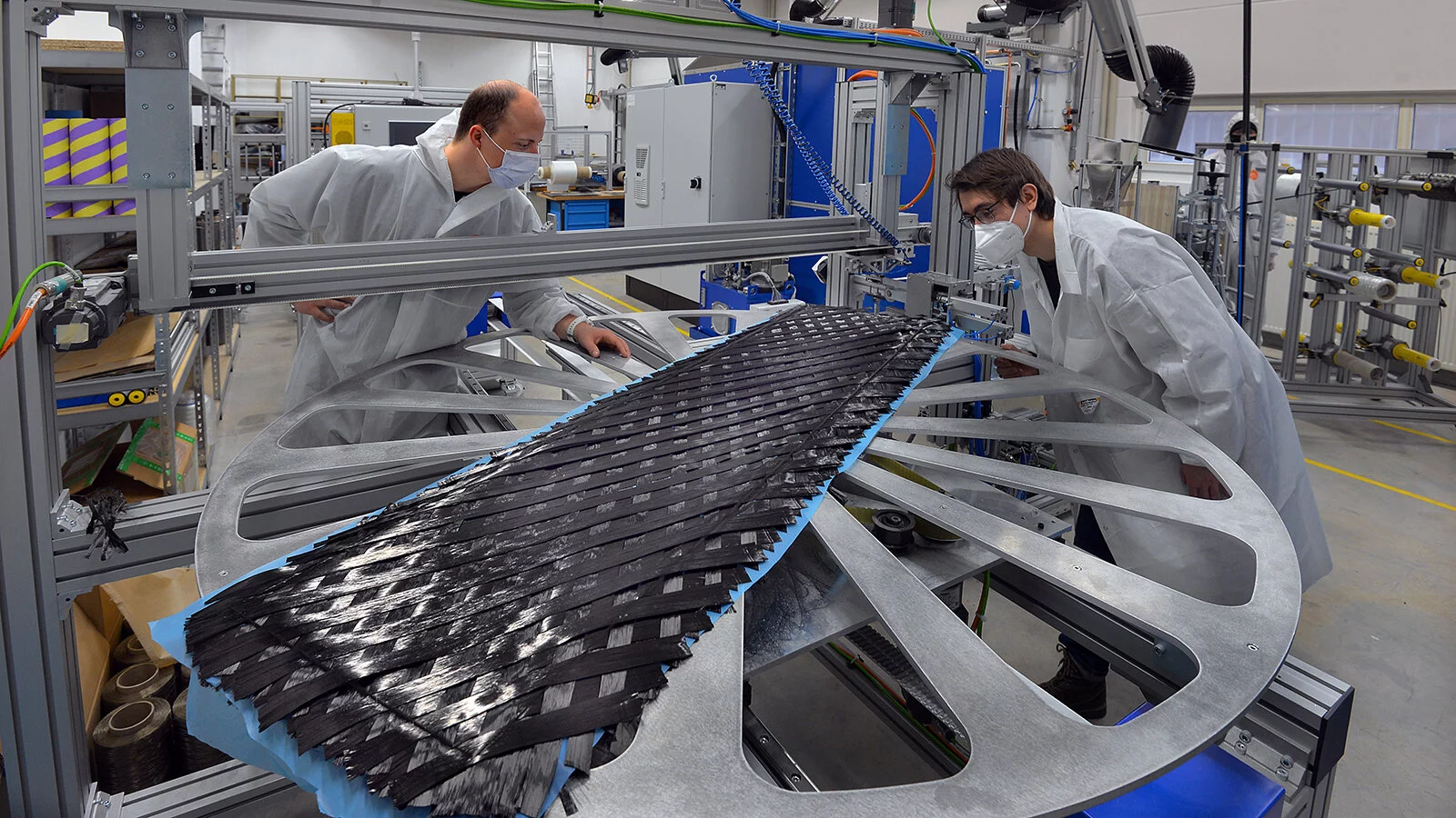 The prototype board was built utilizing a process known as Anisotropic Layer Design (ALD), which is a variation on dry fiber placement