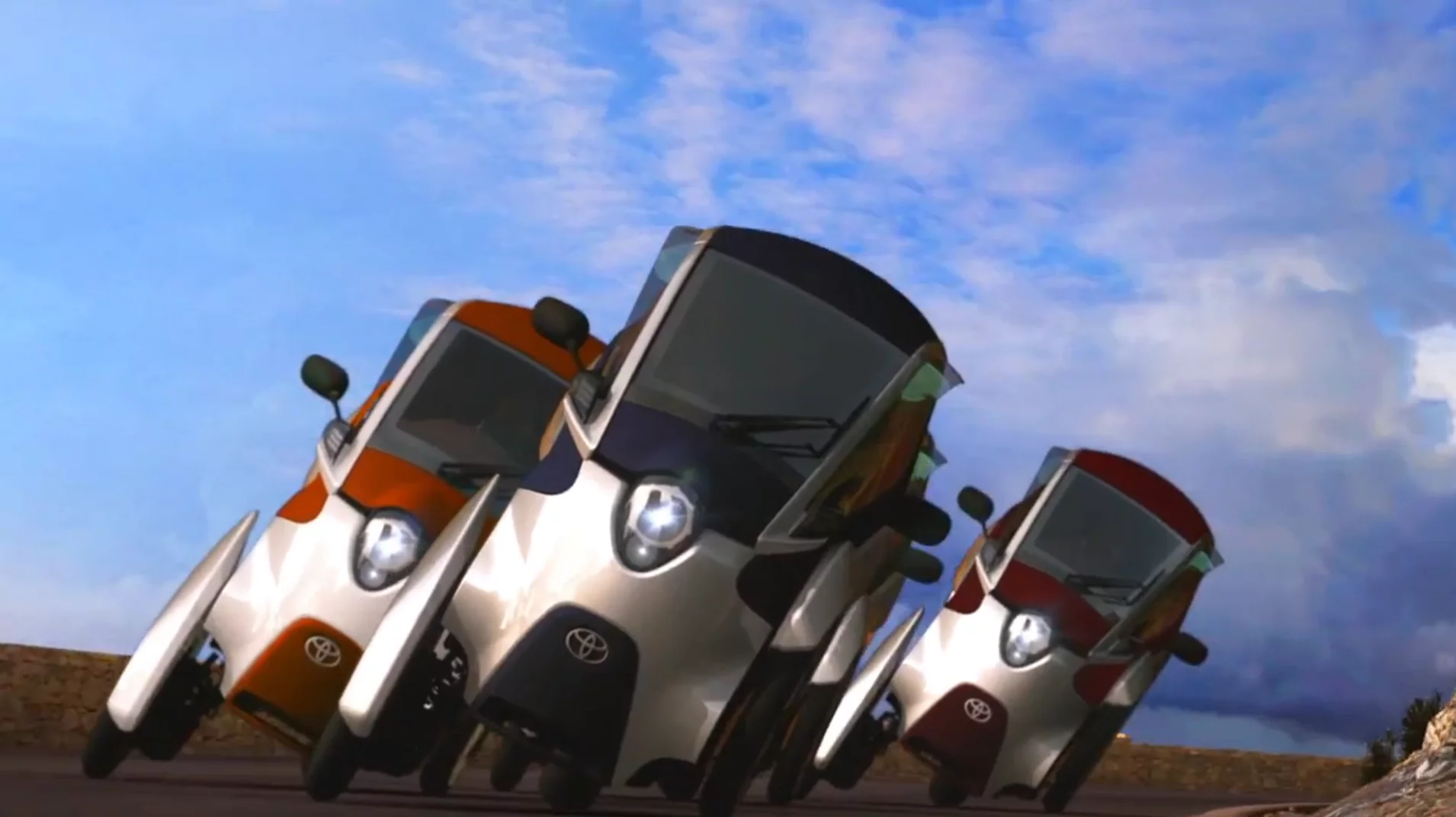 Toyota's i-ROAD is a fully-enclosed, two-seater, three-wheeled, fully-electric, Personal Mobility Vehicle (PMV)