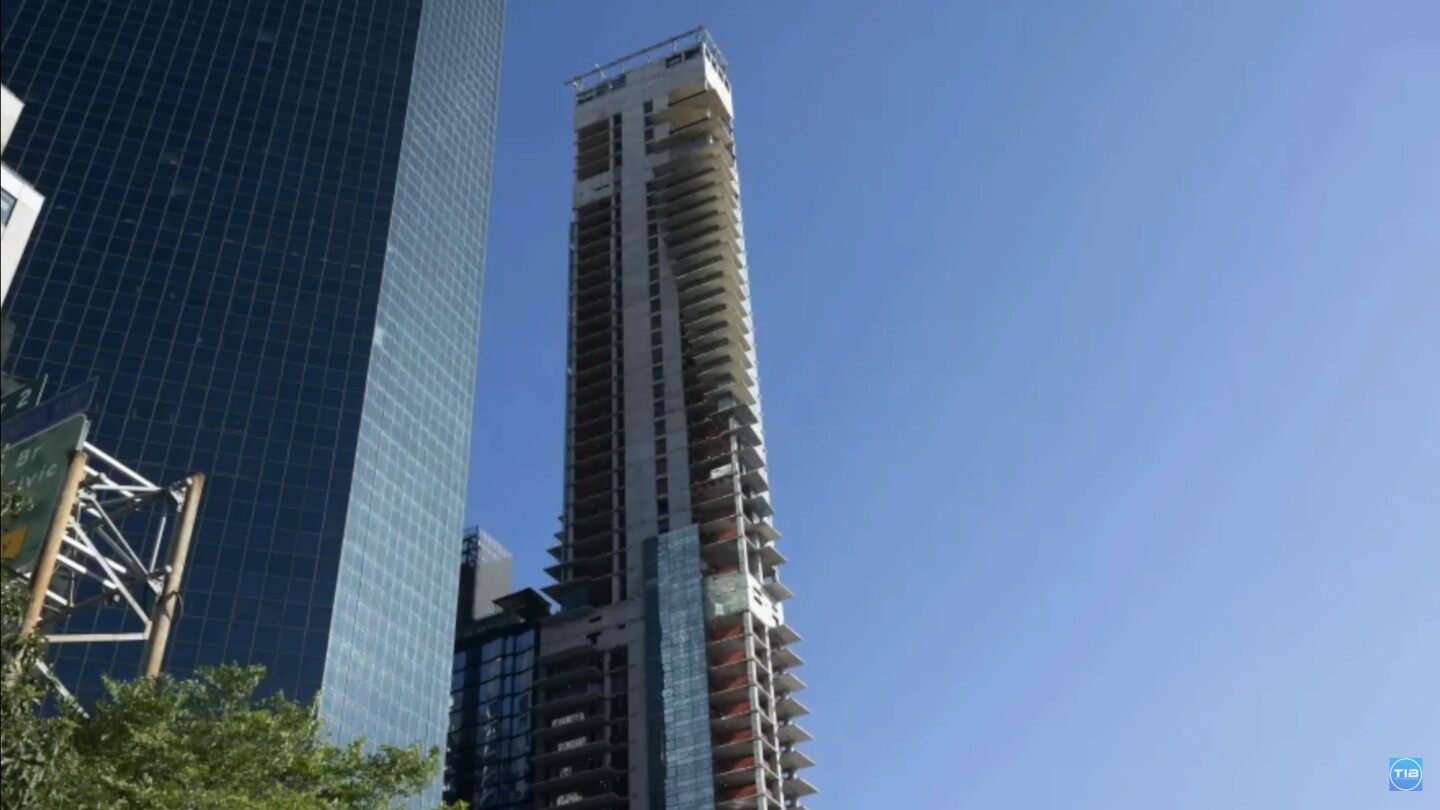 The unfinished and leaning building remains an unfinished eyesore to those who work near 161 Maiden Lane, the site of One Seaport