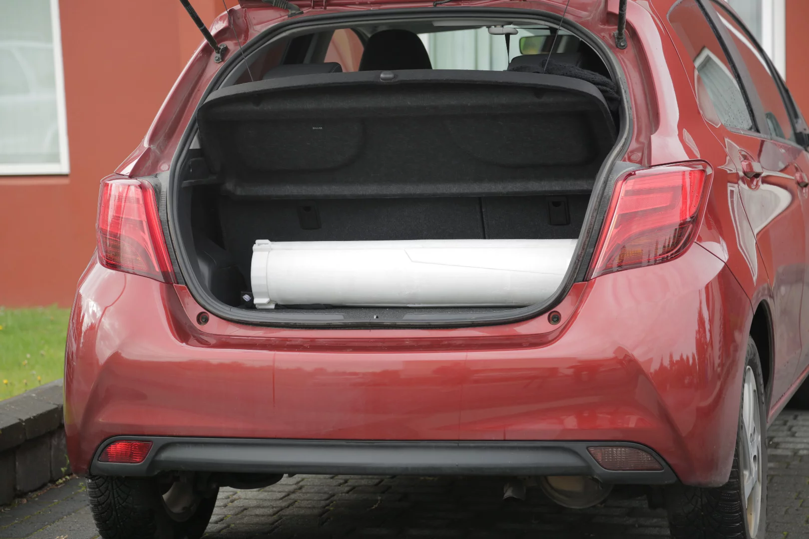 The Trinity 2500 in its travel tube fits easily in the trunk of a car