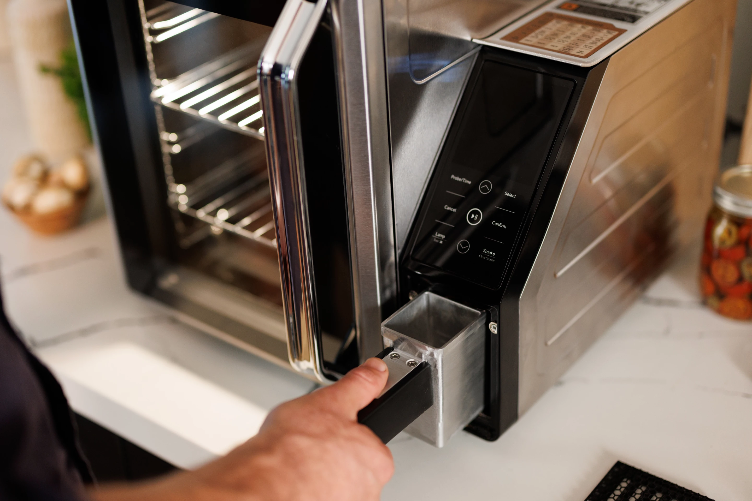 Spent pellets are removed via this container