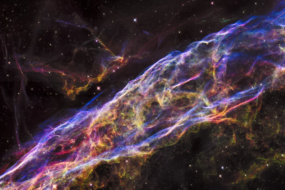 The Veil Nebula, located about 2,100 light-years from Earth in the constellation of Cygnus, is a supernova remnant from a star that would have had 20 times the mass of the Sun.
