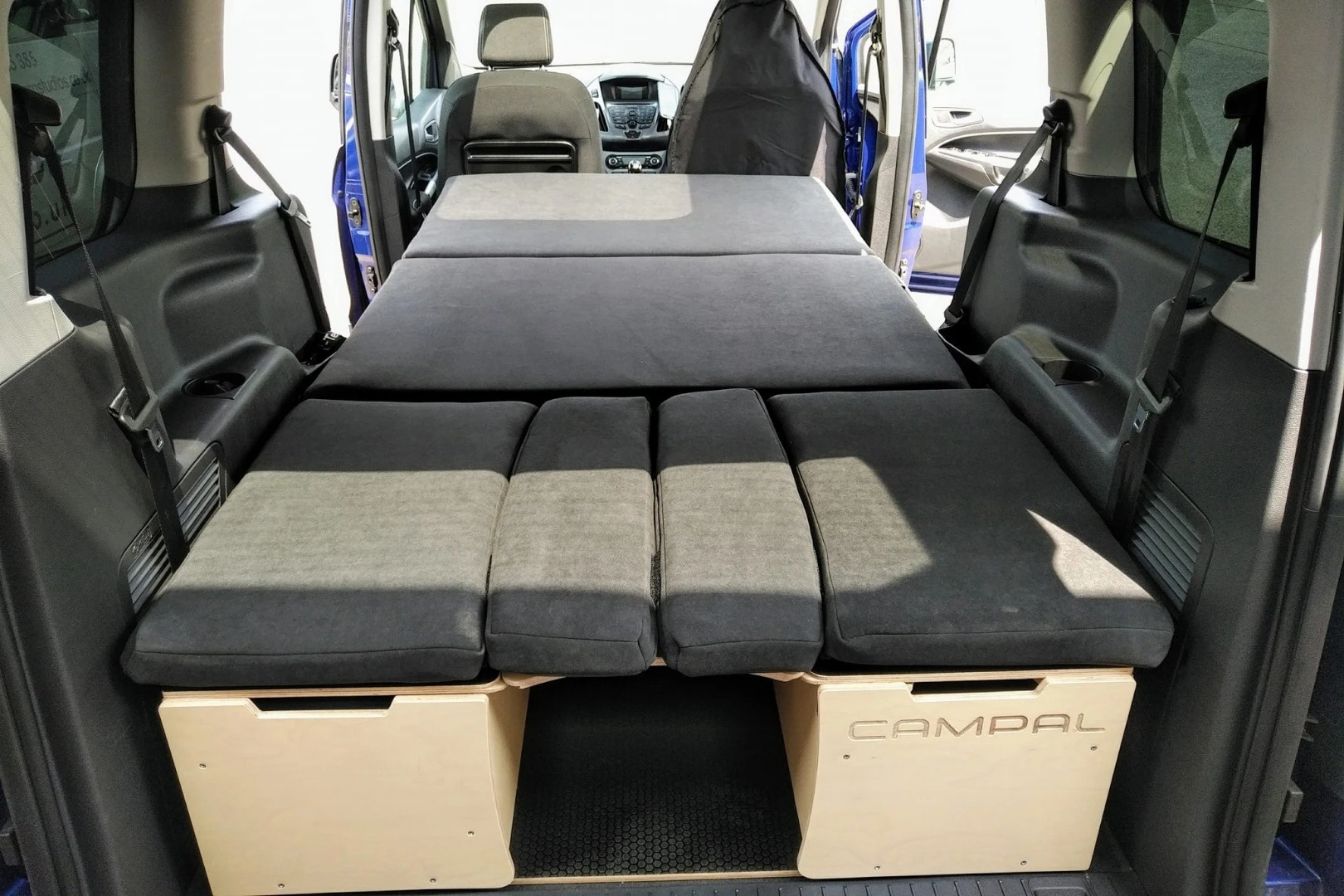 A look at the fully laid out Campal ForTwo bed inside a Ford Tourneo Connect