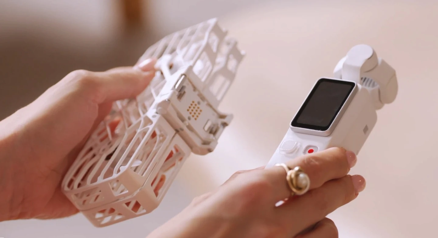 Detaching the wing module separates the Versa into its two core components: a pocket-sized 3-axis camera and a snap-on flight frame