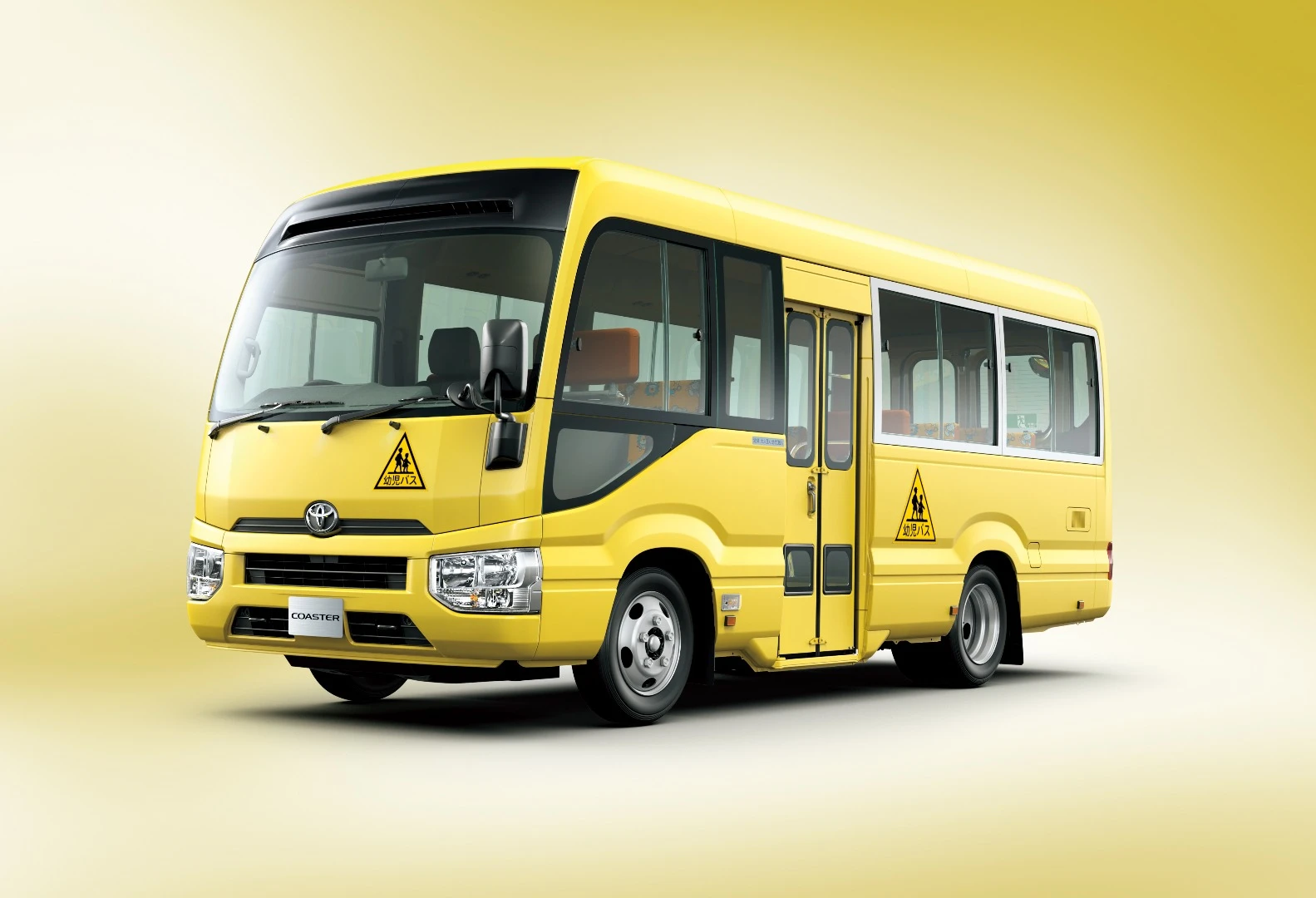 The Coaster in School Bus mode, with hydraulic dual doors in the side
