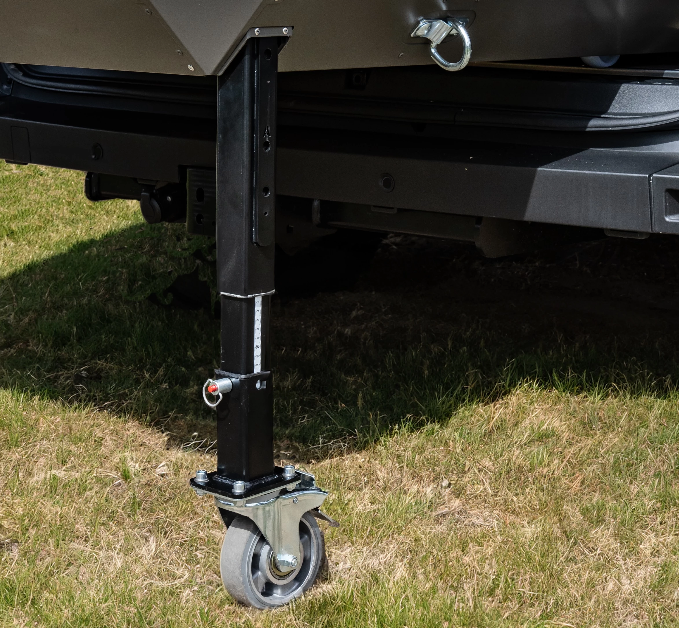The adjustable legs roll the PlugVan module in and out, removing when it's in the van