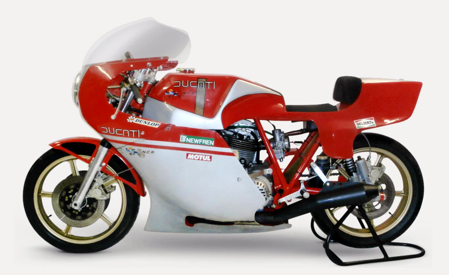 The NCR Ducati for sale here is one of only five manufactured for the 1979 season using the 'round case' engine with an 88 mm bore and 74.4 mm stroke for a displacement of 905 cc. The frame and engine are the original pairing as confirmed by an accompanying document of authentication. The bike has had only two owners, both collectors, and the engine has been taken apart only once, by a German Ducati expert to determine its originality and condition, the process being extensively documented with numerous photographs. The professional consulting engineer's signed report (dated 17th February 2015) is on file together with other paperwork relating to its earlier history. Described as "mint" condition, this NCR is an unmolested example of a significant historic racing motorcycle.