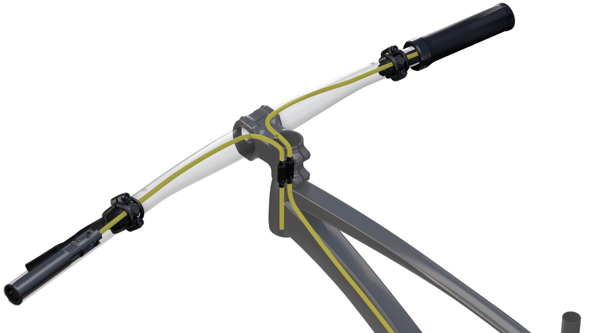 A hose runs from the inside end of each MCi cylinder through the bar to a coupler within the stem, with two other hoses proceeding from that coupler to each of the brakes