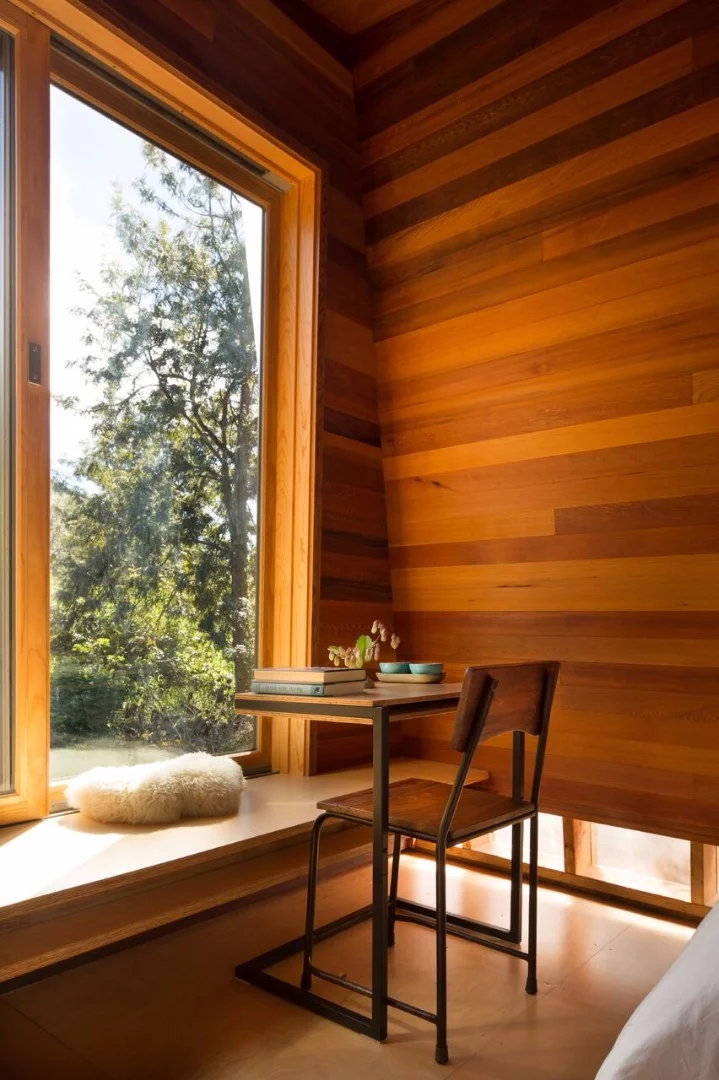Mauka features large glass sliding doors and stunning wooden finishing throughout
