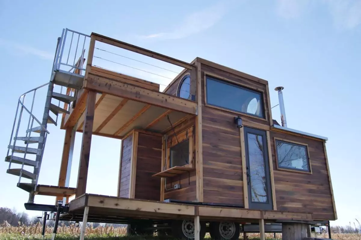 Carpenter Owl has installed a folding table that seats four on the Honey on the Rock's upper deck, which is also home to an outdoor tub