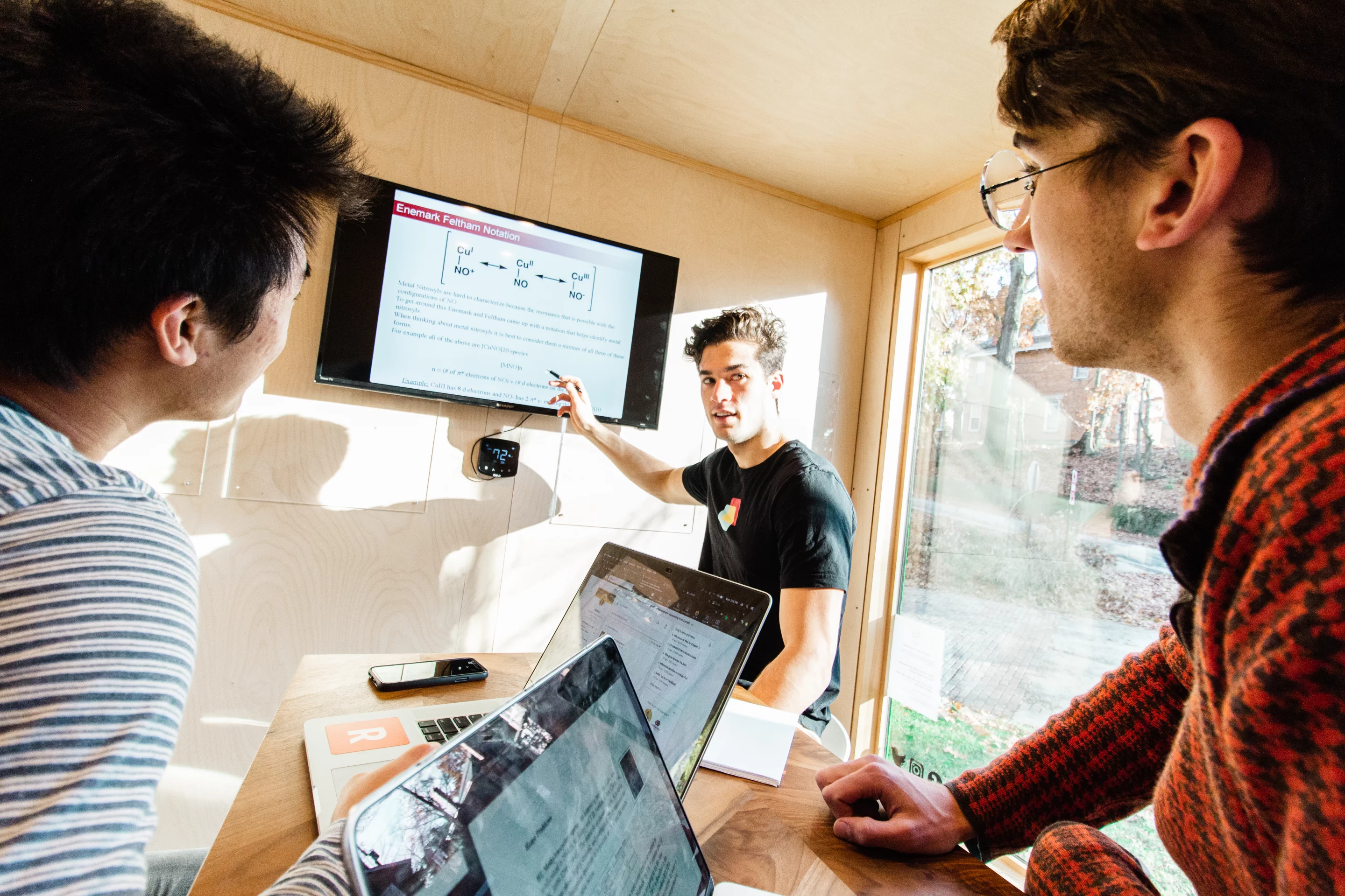 The ootbox's interior sports a finished/insulated plywood ceiling and walls, carpeted flooring, motion-activated lighting, and a smart thermostat