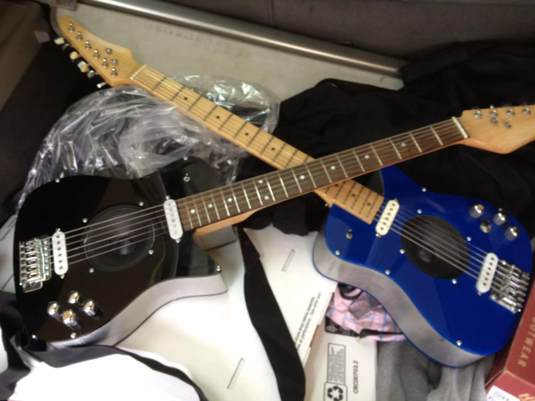 Black Unlimited with Rosewood fingerboard and blue edition with Maple