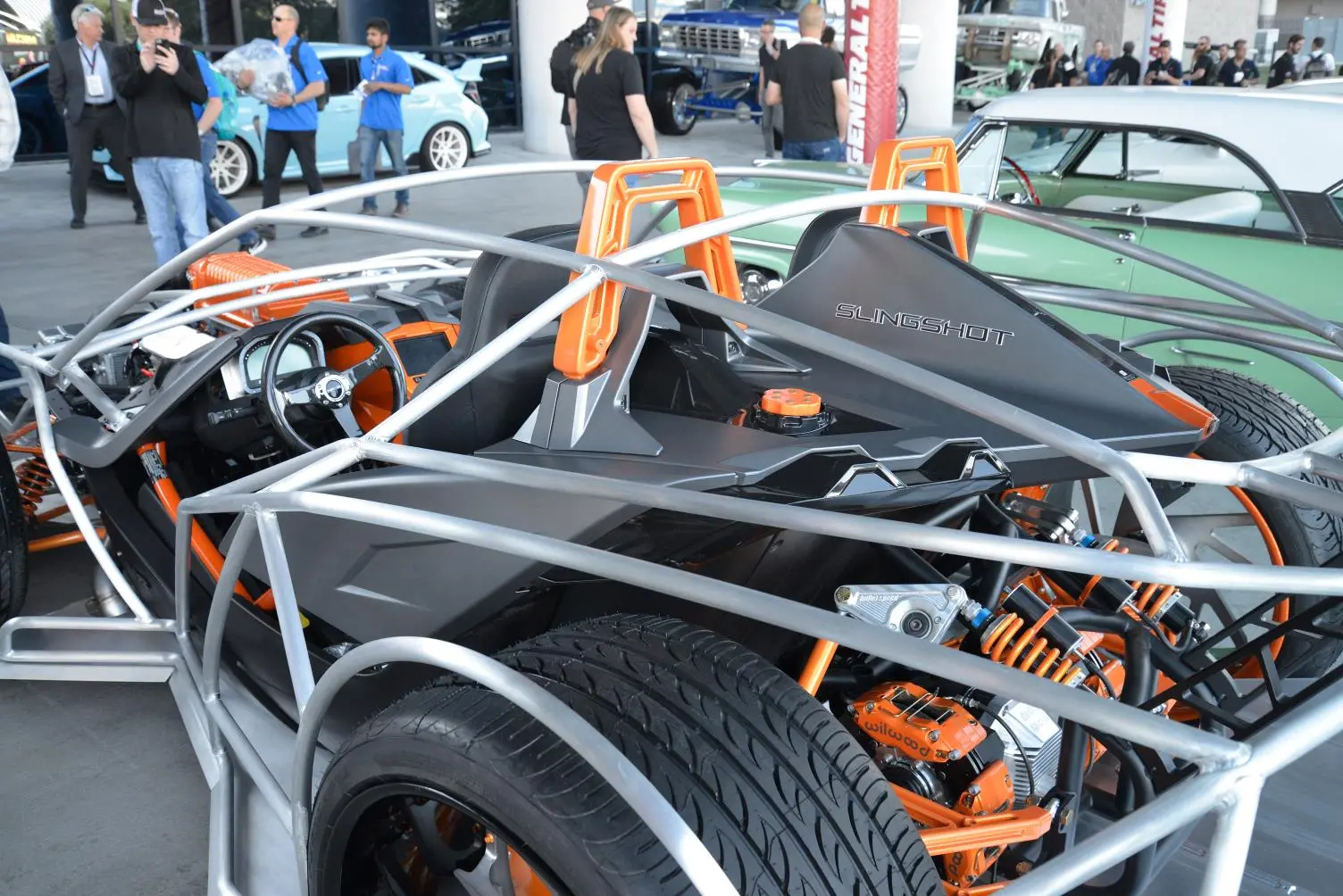 A rather skeletal Polaris Slingshot with four-wheel conversion kit
