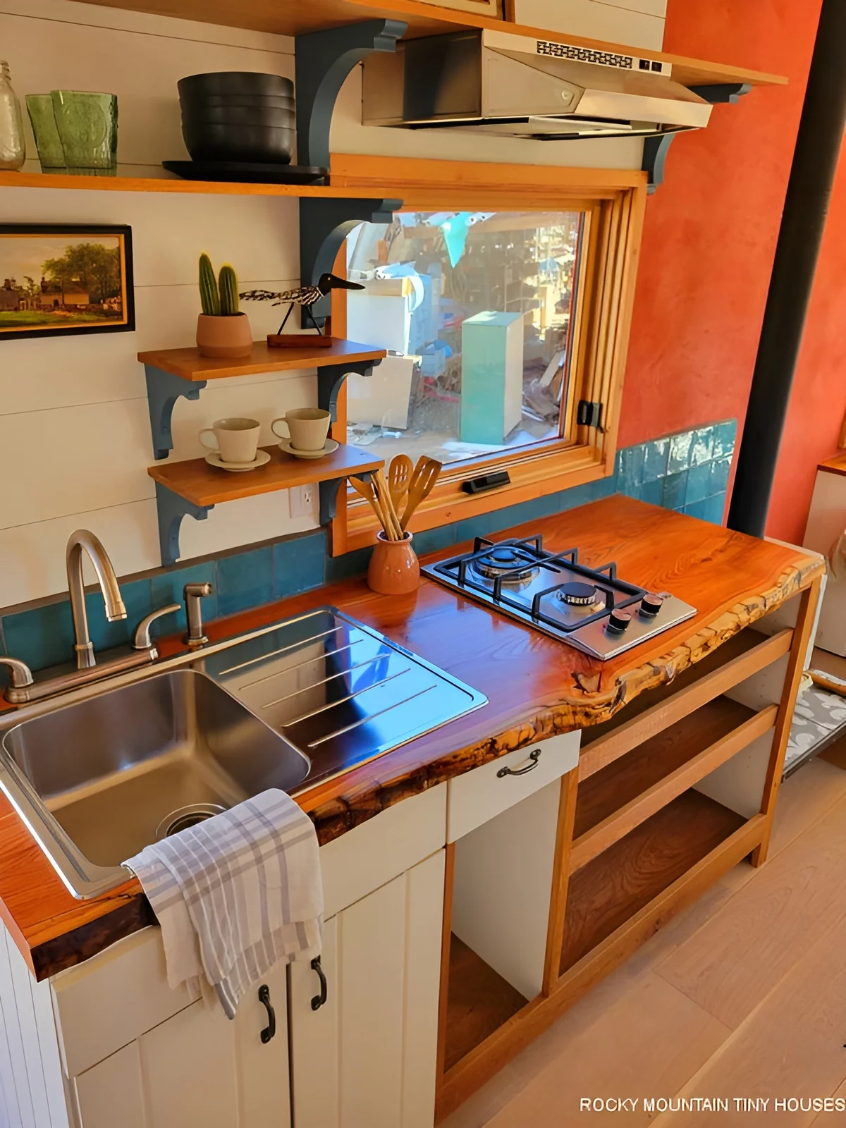 The Beatle's kitchen includes a two-burner propane-powered stove