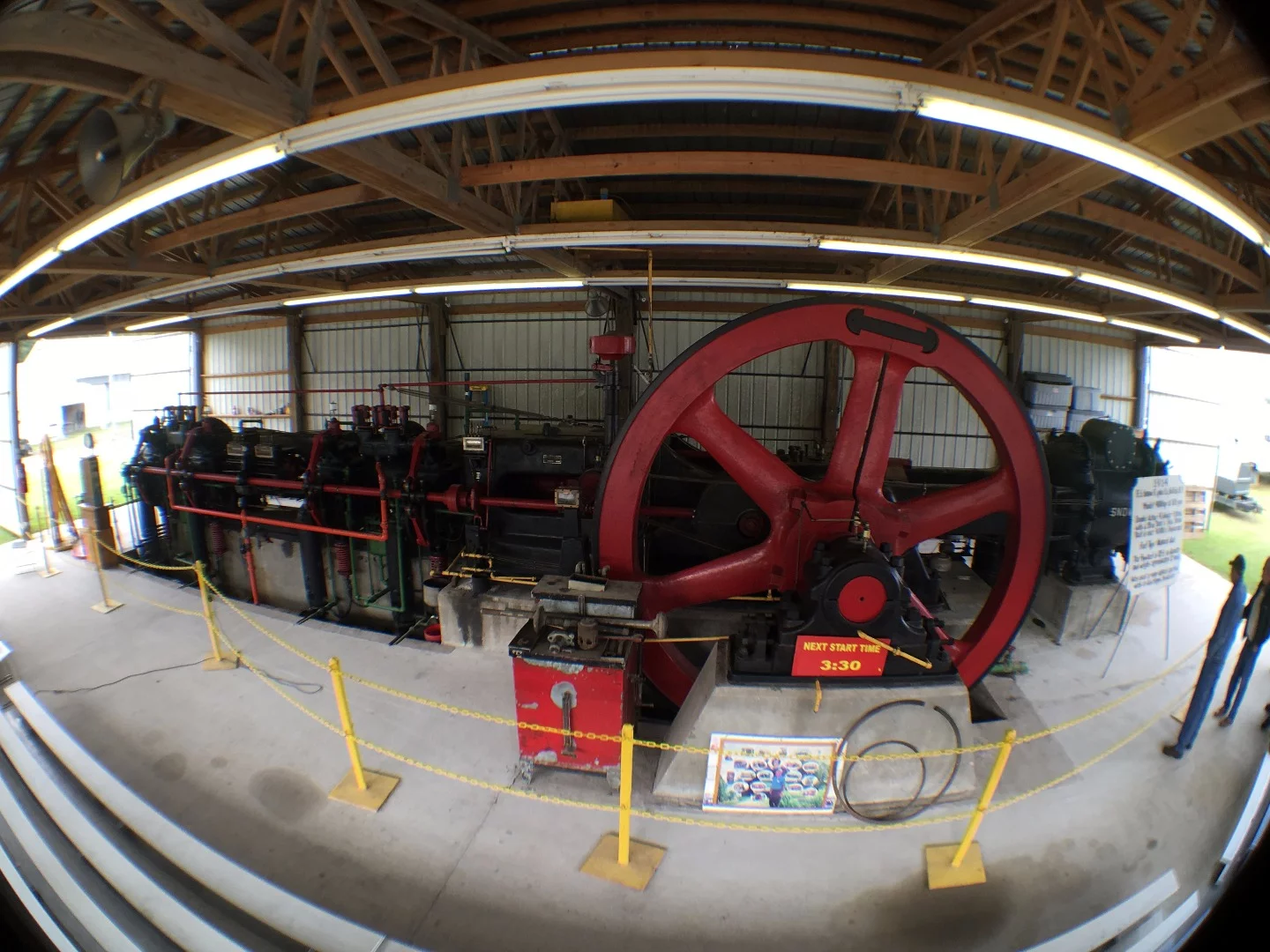 The Mother of all flywheels: This running 1914 engine features a 12 ton flywheel 12 feet in diameter. It made 400 horsepower at 120 rpm and was used to pump natural gas (which was also its fuel type) from the wells to the gas supply businesses. How big is it you ask? A mere 40,000 c.i.