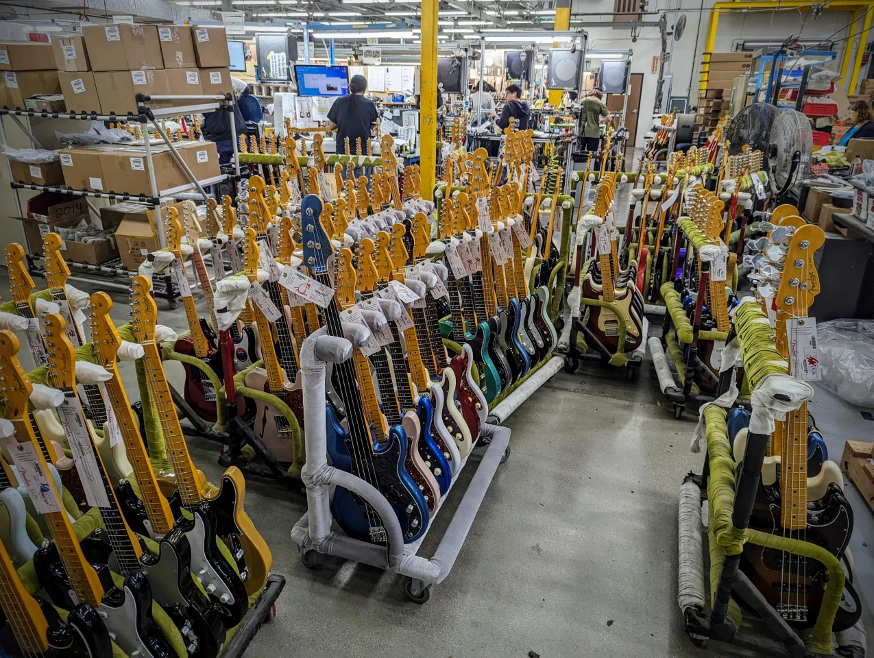 Finished guitars and basses ready to be cased, bagged, boxed and sent on