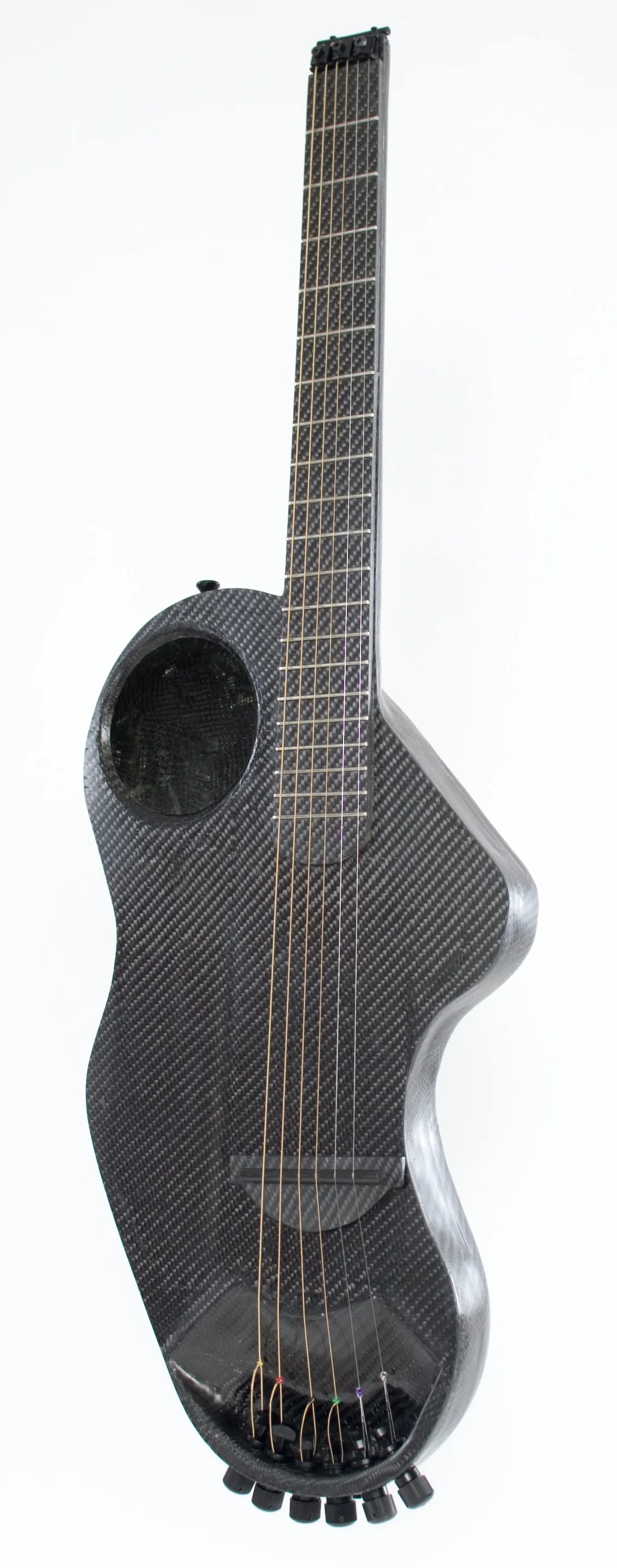 The Alpaca's sound hole has been repositioned for convenience, to provide easy access to any soft goods that are stored inside while traveling