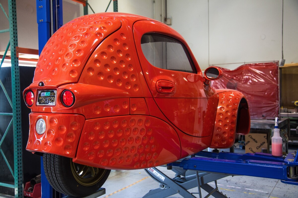 Corbin Sparrow electric threewheeler, now with dimpled backside