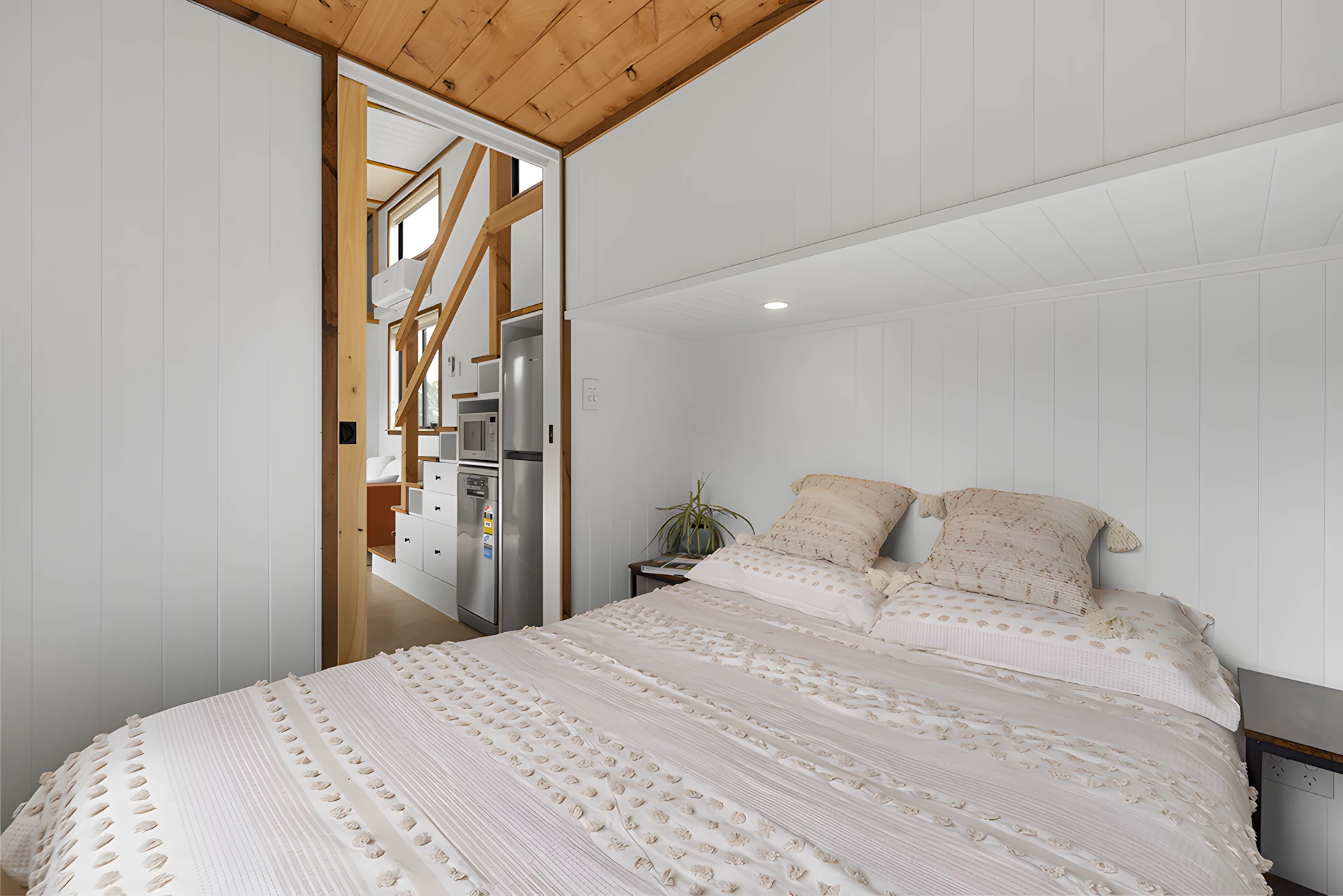 The Grevillea's downstairs bedroom has ample headroom to stand upright and includes a double bed