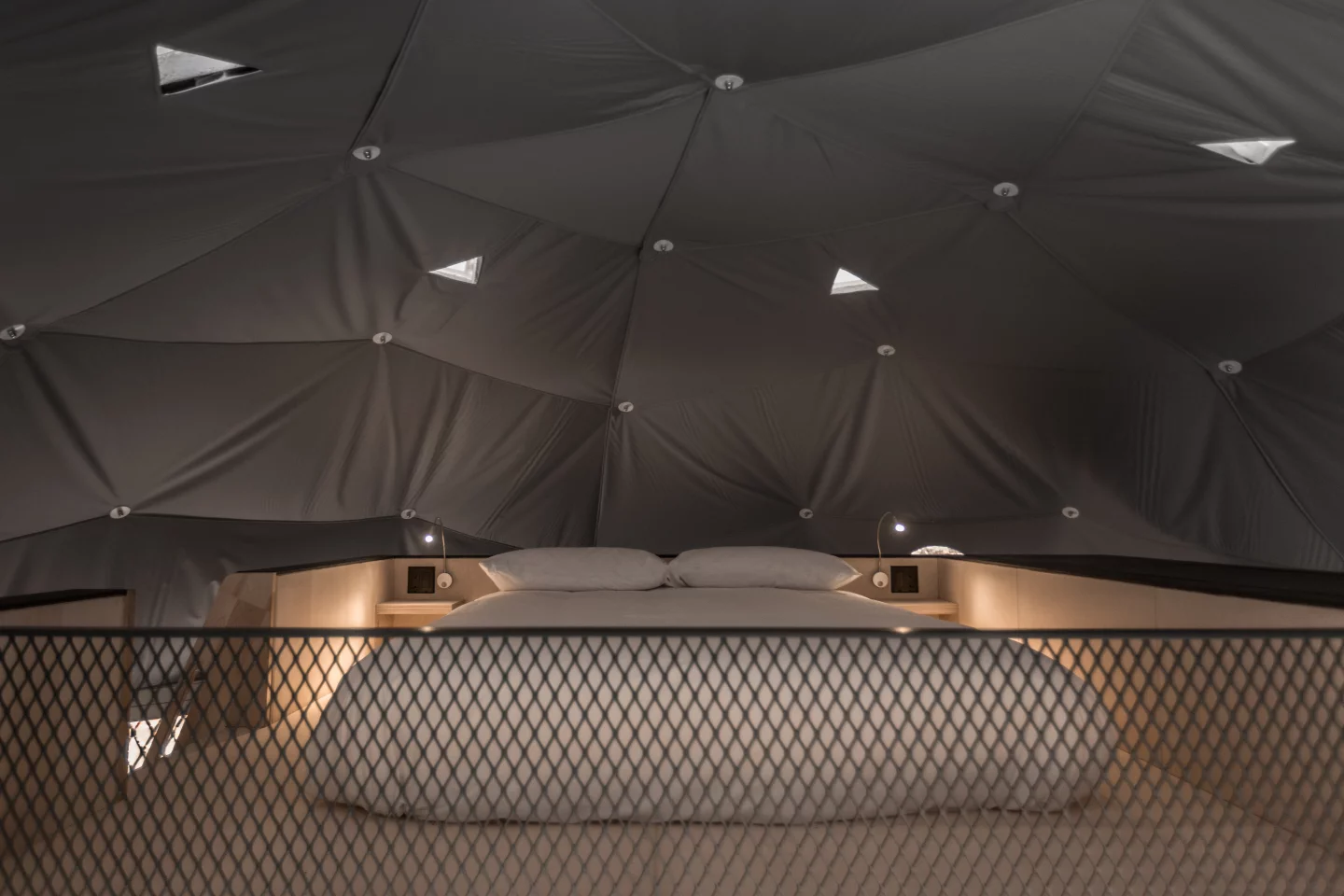 The elevated second sleeping quarters with full queen size bed