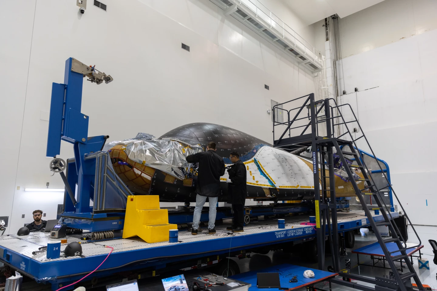 Teams process Dream Chaser Tenacity, Sierra Space's uncrewed cargo spaceplane, inside the Space Systems Processing Facility (SSPF) at Kennedy Space Center in Florida