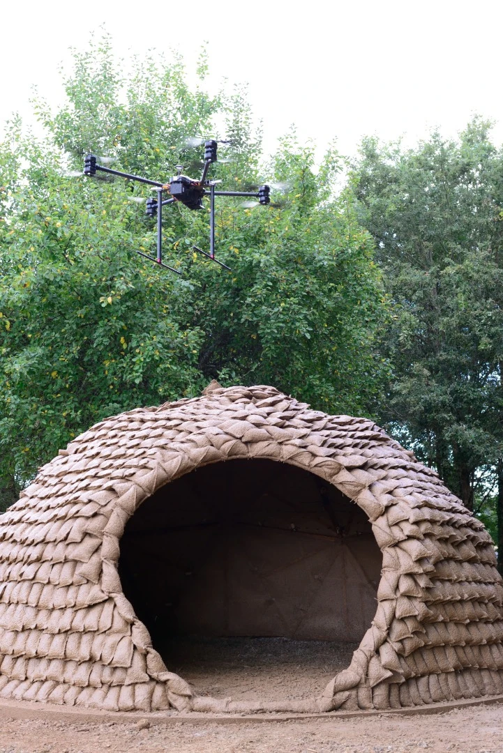 A mud-spraying drone hovers above Chaltiel's dome