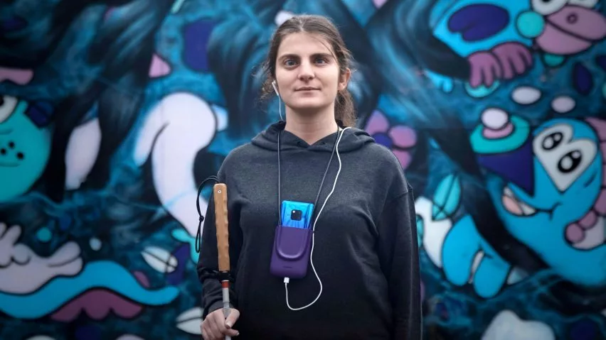 A 3D-printed lanyard-style phone holder was designed for use with the Facing Emotions app