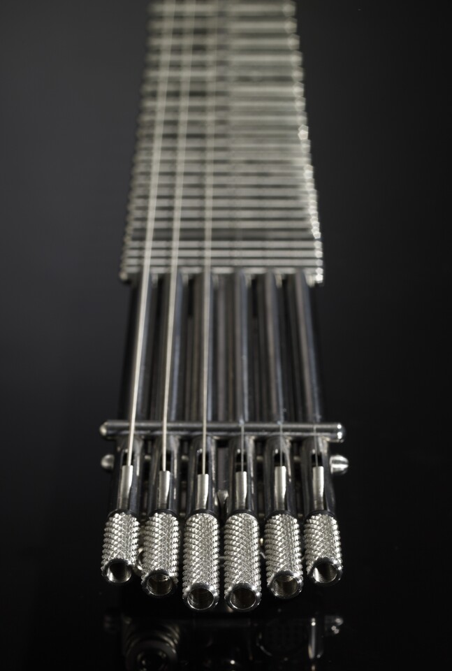 Each string of the updated Gittler guitar has its own magnetically isolated transducer