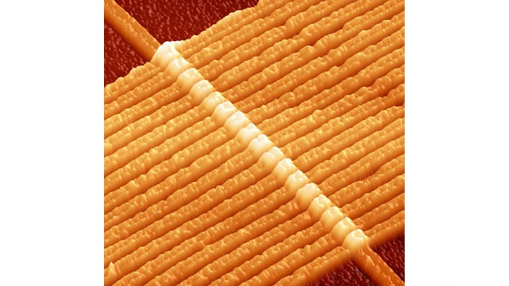 An image of a circuit with 17 memristors, each composed of two layers of titanium dioxide connected by wire, captured by an atomic force microscope. (Image: HP Labs)