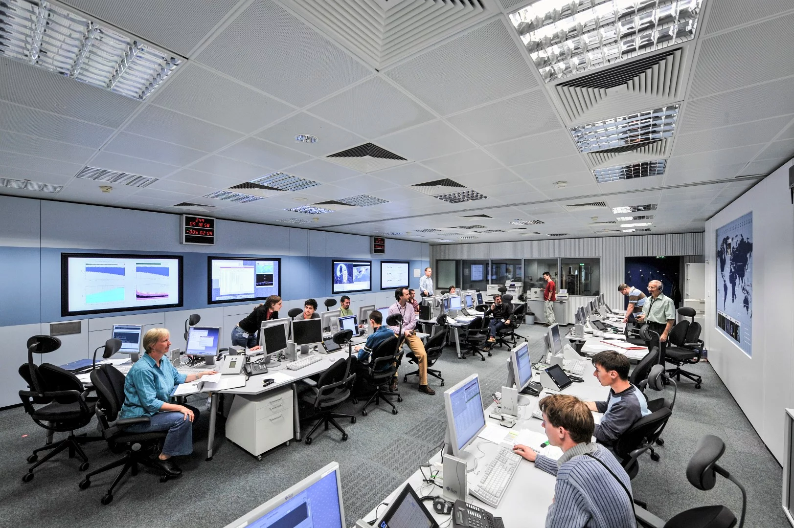 Flight dynamics experts working on the TGo orbital maneuvers