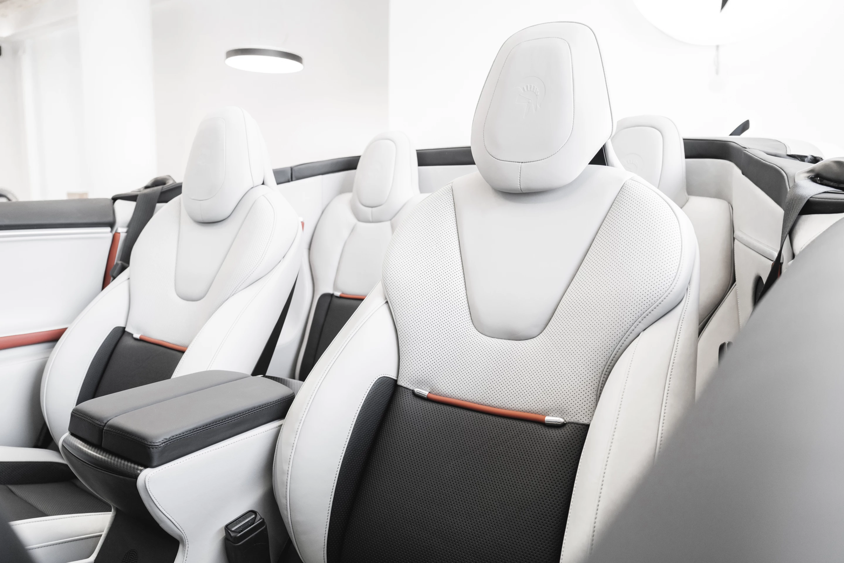 Ares adds in custom rear seats and covers the interior in hand-stitched leather