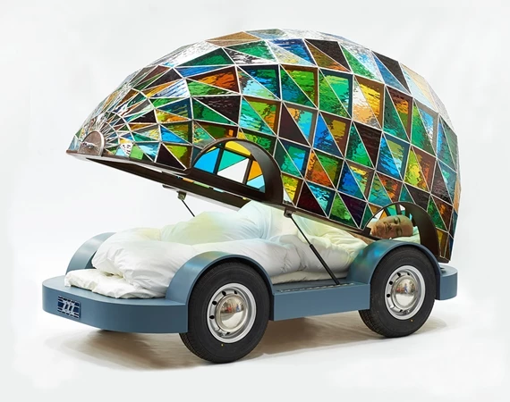 The Stained Glass Driverless Sleeper Car uses hydraulics to open and close its stained glass shell (Image: Sylvain Deleu)