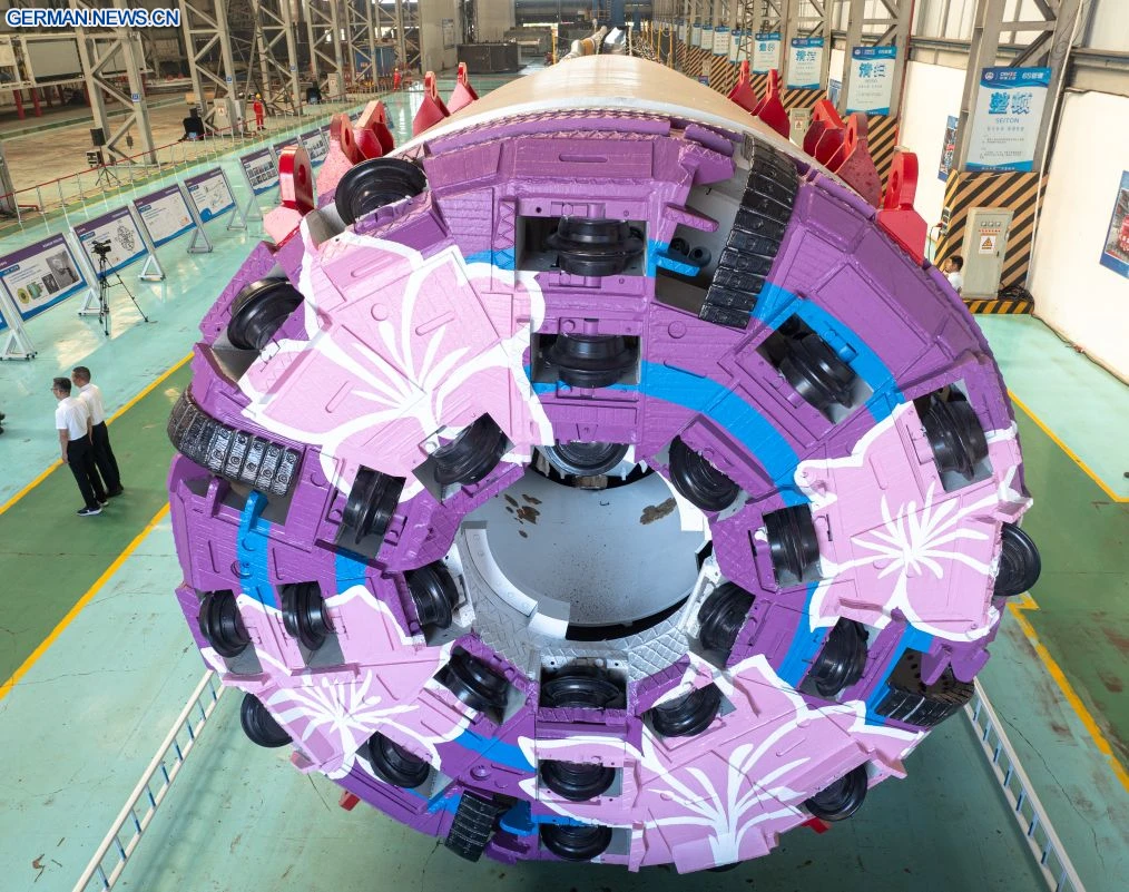 The cutterhead includes access channels for laying down explosives