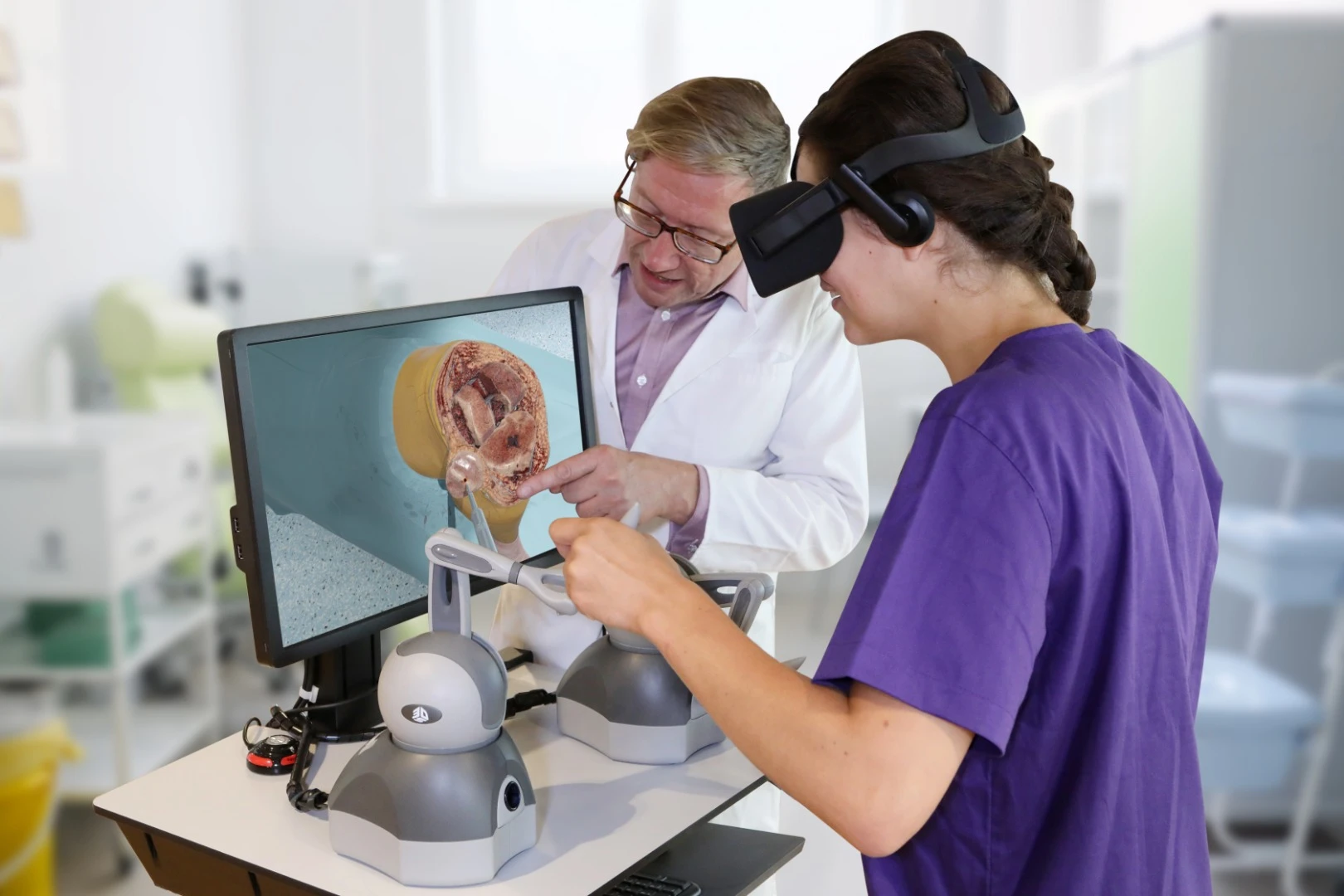 A student uses the Fundamental Surgery system to perform a virtual knee operation