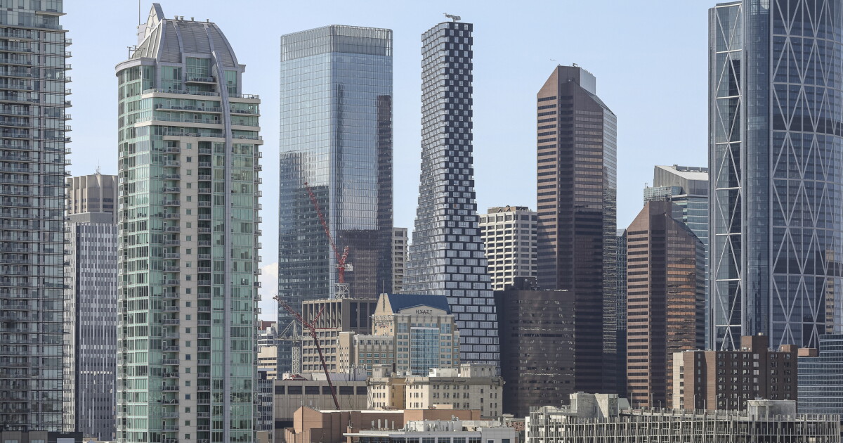 Pixelated mixed-use tower twists as it tapers from ground to sky Pixelated mixed-use tower twists as it tapers from ground to sky