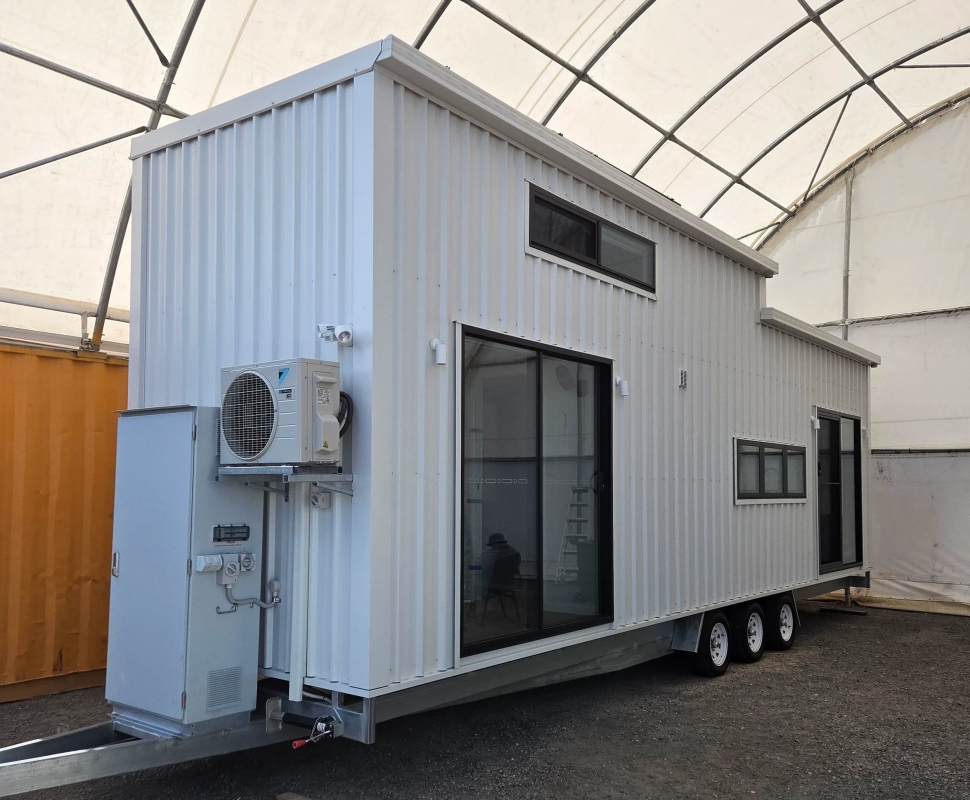 Two-bedroom tiny house combines portability with a roomy interior
